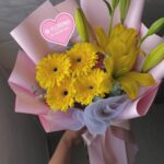 Lirios y gerberas